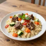 Nationalgericht Algerien: Couscous bel Lham (Rezept) Nationalgericht Algerien: Couscous bel Lham (Rezept)