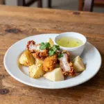 Nationalgericht El Salvador: Chicharrones con Yuca (Rezept) Nationalgericht El Salvador: Chicharrones con Yuca (Rezept)