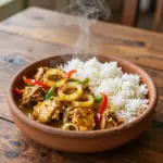 Nationalgericht Gambia: Chicken Yassa (Rezept) Nationalgericht Gambia: Chicken Yassa (Rezept)