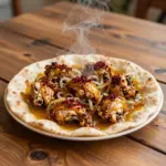 Nationalgericht Kuwait: Chicken Musakhan (Rezept) Nationalgericht Kuwait: Chicken Musakhan (Rezept)