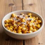 Nationalgericht Sierra Leone: Roasted Corn and Coconut Snack (Rezept) Nationalgericht Sierra Leone: Roasted Corn and Coconut Snack (Rezept)