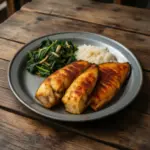 Nationalgericht Simbabwe: Grilled Tilapia with Sadza (Rezept) Nationalgericht Simbabwe: Grilled Tilapia with Sadza (Rezept)