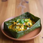Nationalgericht Sri Lanka: Banana Leaf Wrapped Fish Curry (Rezept) Nationalgericht Sri Lanka: Banana Leaf Wrapped Fish Curry (Rezept)